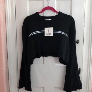 SEEK the label sweater